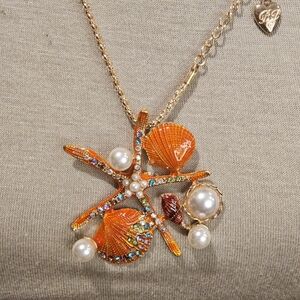 ORANGE STARFISH STATEMENT NECKLACE
